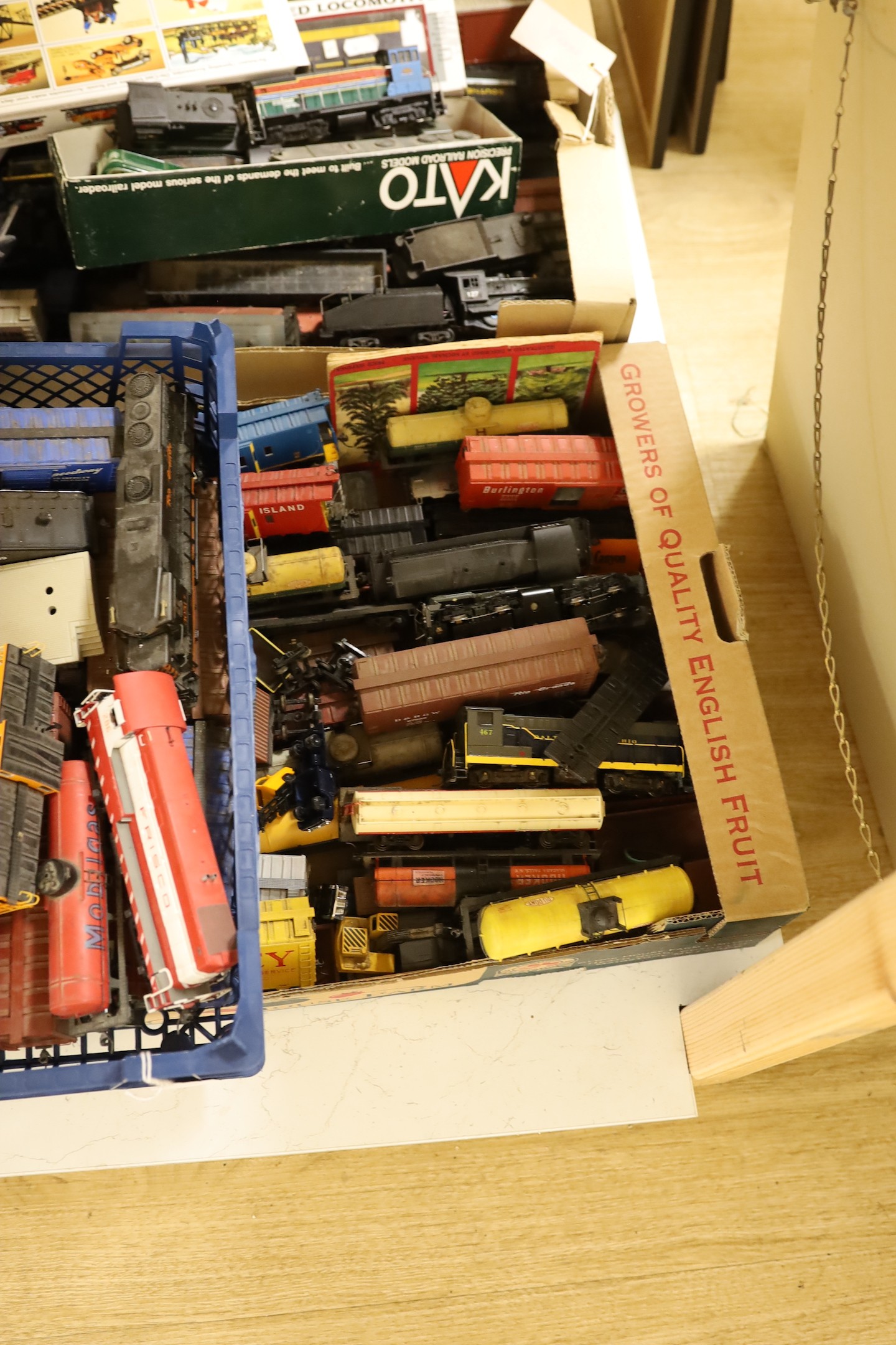 A large collection of 00 gauge toy locomotives and rolling stock